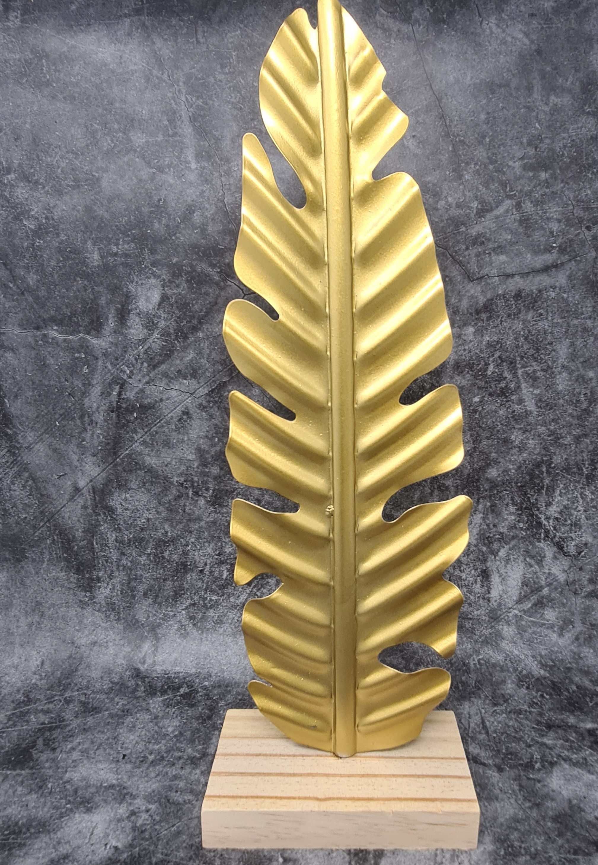 Modern sculpture decorative figure golden leaf made of metal and on wooden base 16x43 cm