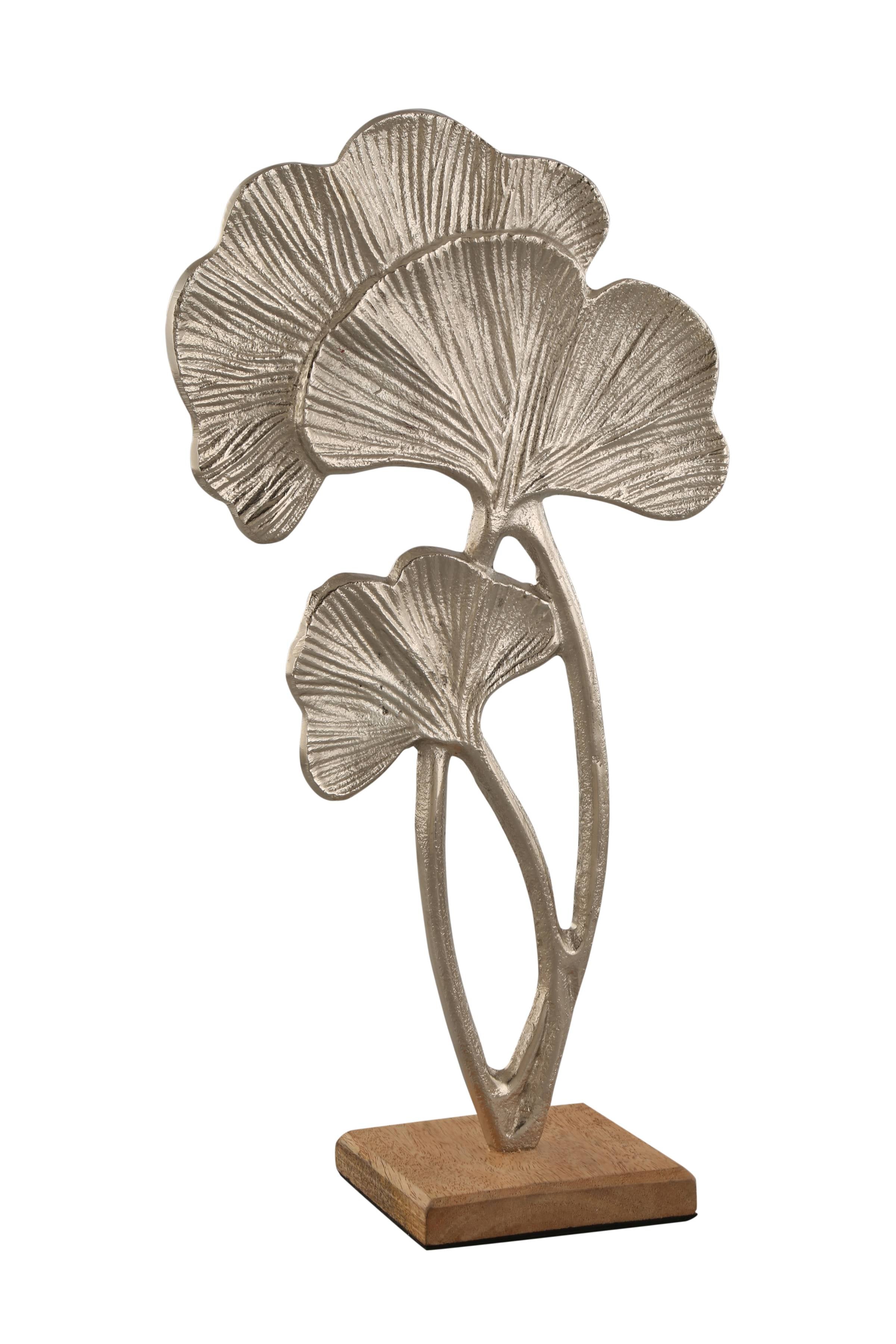 Sculpture figure décorative feuilles tropicales argent en métal posée sur un socle en bois 21x39 cm