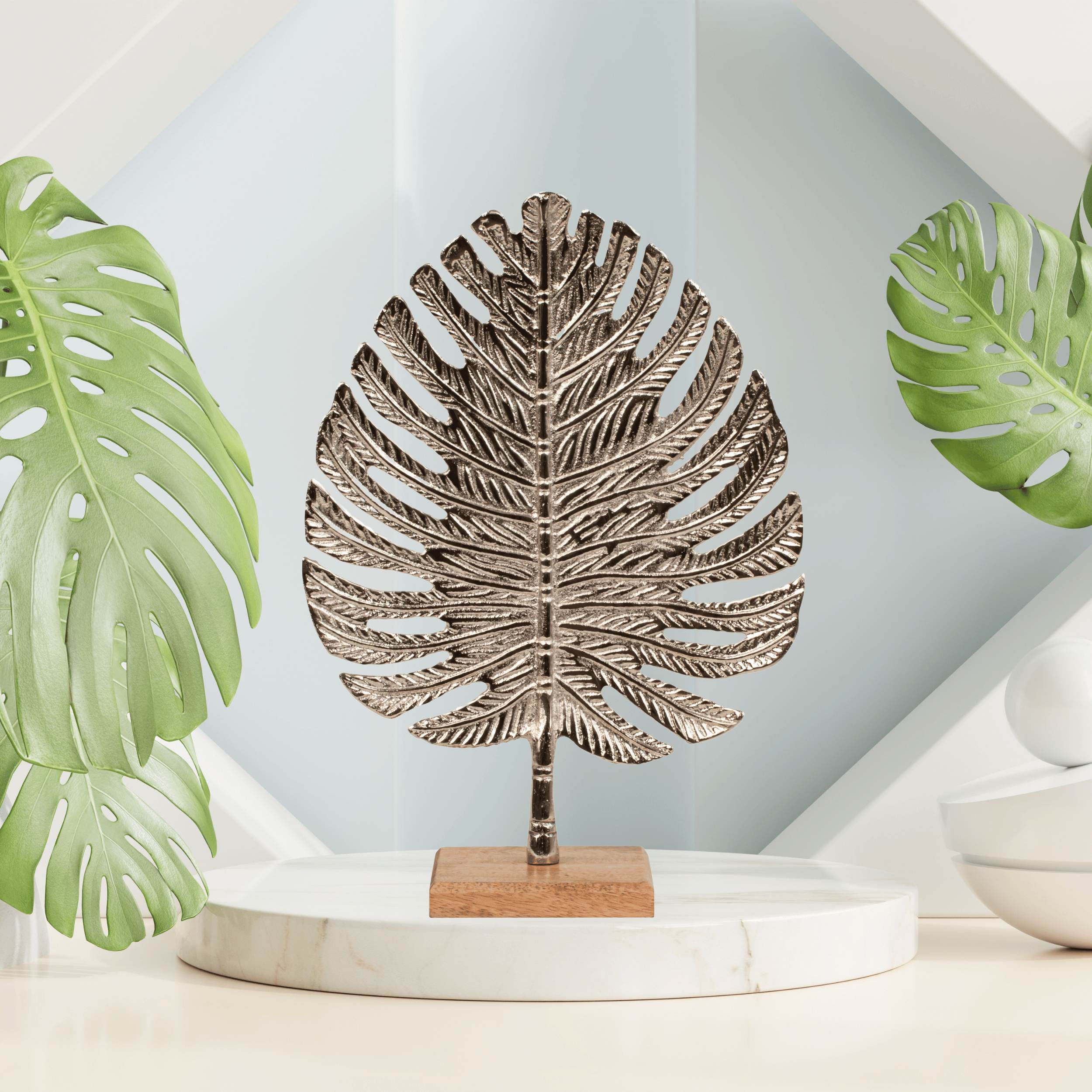 Sculpture decorative figure leaf made of metal silver on wooden base standing 23x32 cm