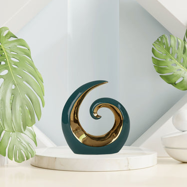 Moderne Skulptur aus Porzellan in Petrol mit Verzierung in Gold Höhe 19 cm Breite 17 cm - Lifestyle & More