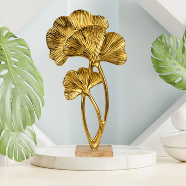 Skulptur Dekofigur Tropenblätter gold aus Metall auf Holzsockel 21x39 cm - Lifestyle & More